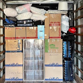 Tightly packed Budget Movers truck showing careful loading