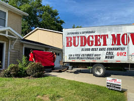 Budget Movers truck parked at an Omaha home, ready to load