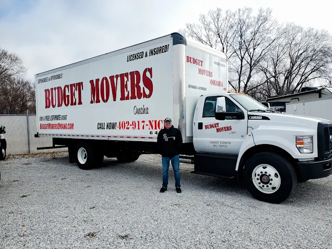 Budget Movers Omaha box truck with team member, licensed and insured